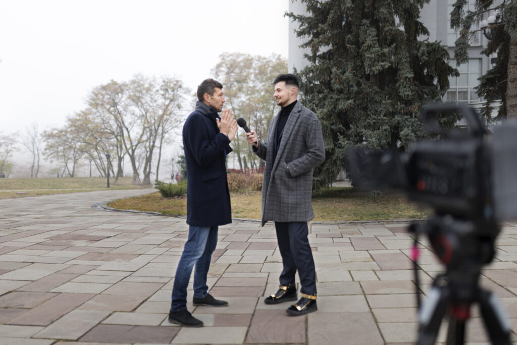 close up reporter taking interview